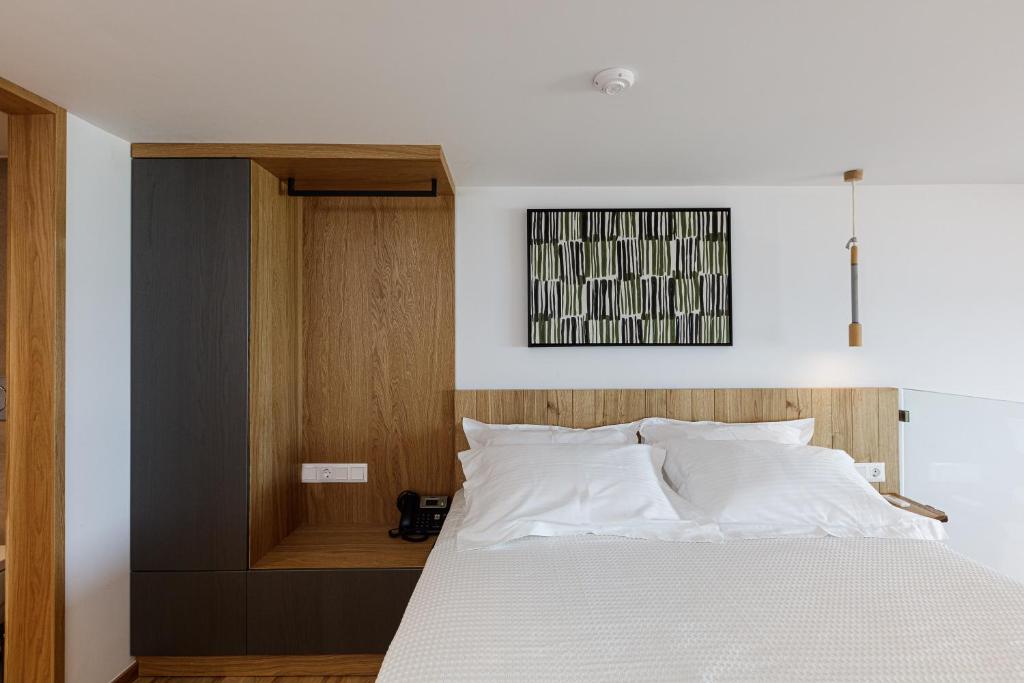 Postel nebo postele na pokoji v ubytování North Coast Seaside Suites