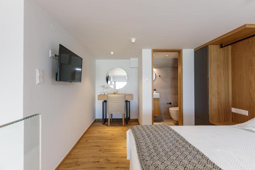Postel nebo postele na pokoji v ubytování North Coast Seaside Suites