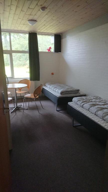 Postel nebo postele na pokoji v ubytování Danhostel Nykøbing Mors