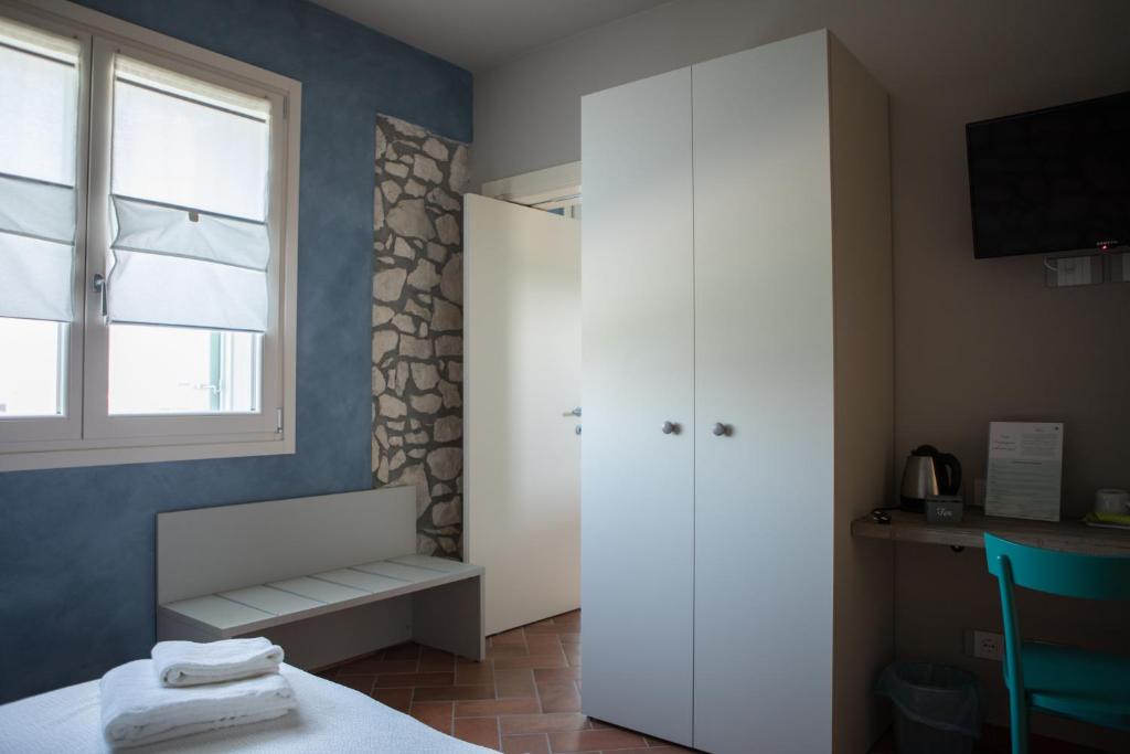 A bed or beds in a room at B&B Casa Campagnari