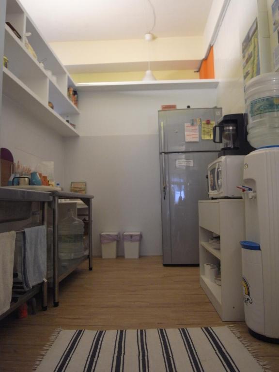 Kuchyň nebo kuchyňský kout v ubytování Sleeping Boot Hostel