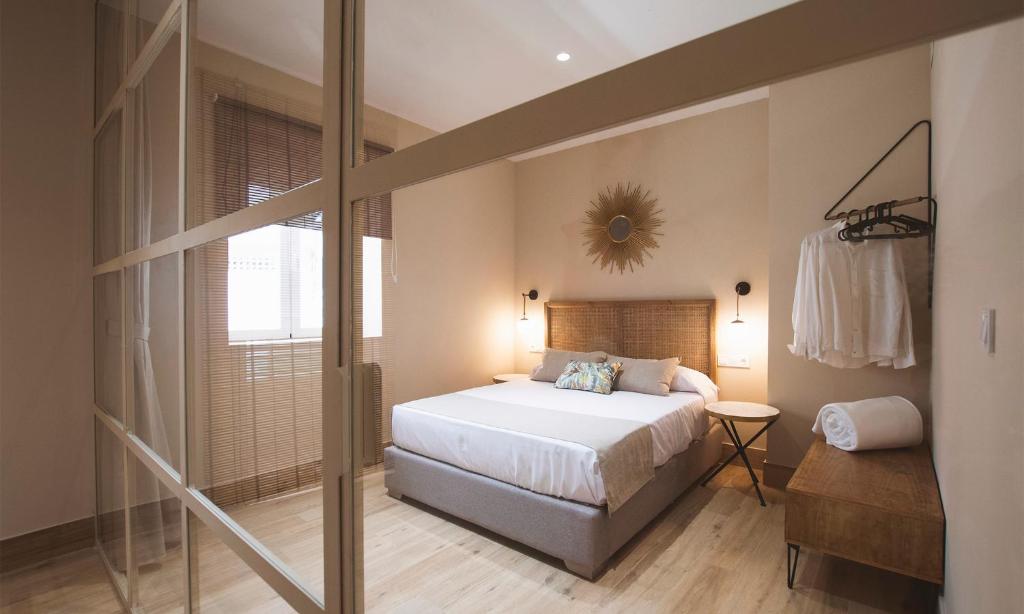 En eller flere senge i et værelse på Terraza Playa de Cádiz 2 Ha Apartment