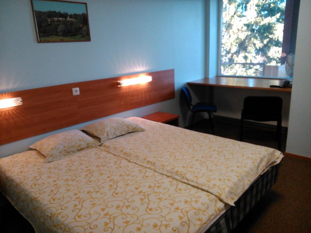 Voodi või voodid majutusasutuse Männimäe Guesthouse toas