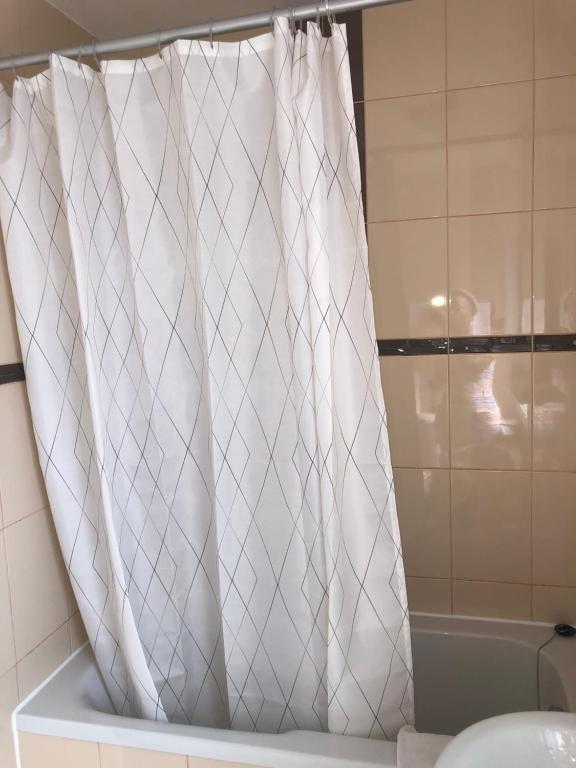 Koupelna v ubytování Sun Hotel