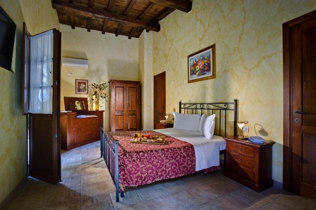 Posteľ alebo postele v izbe v ubytovaní Villa Hotel Valle Del Marta Resort