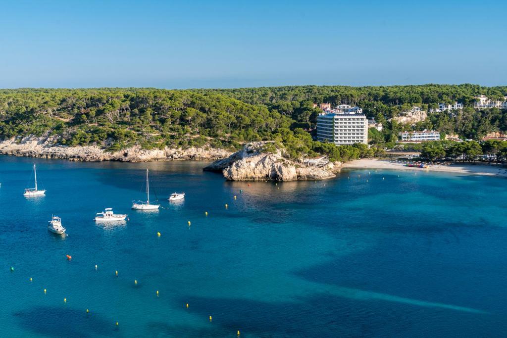 an aerial view of a harbor with boats in the water at ARTIEM Audax - Adults Only in Cala Galdana