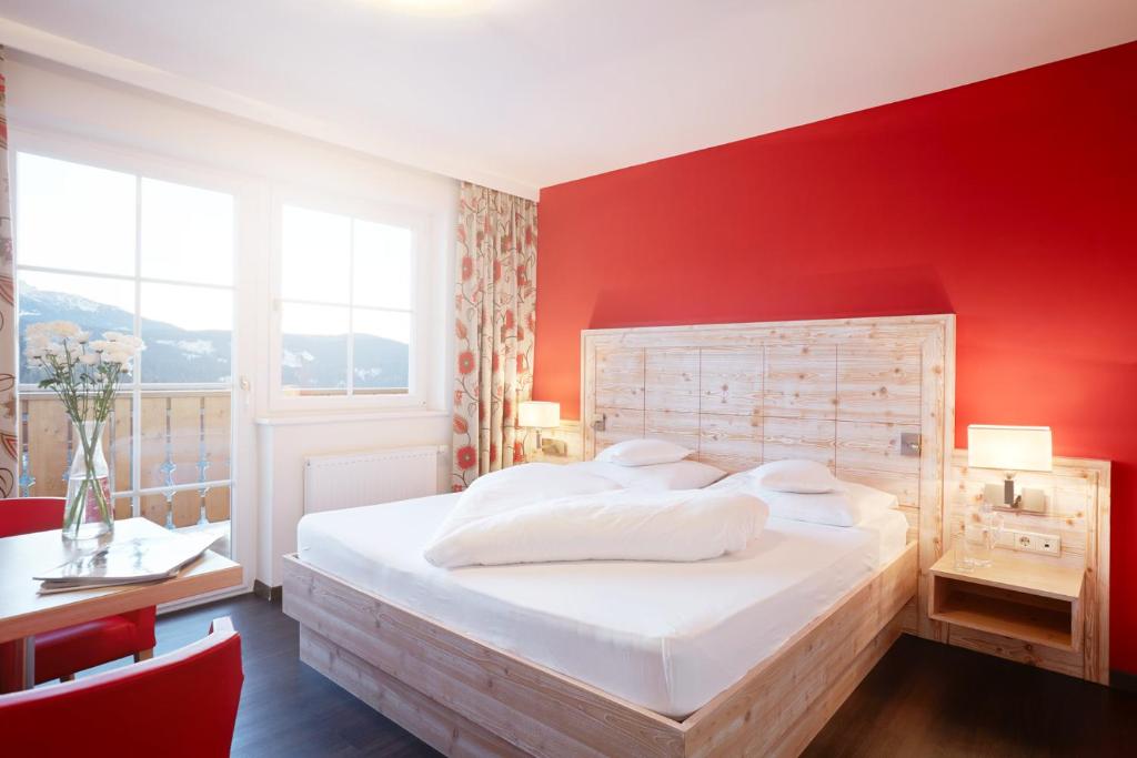 Postel nebo postele na pokoji v ubytování Familienhotel Maria