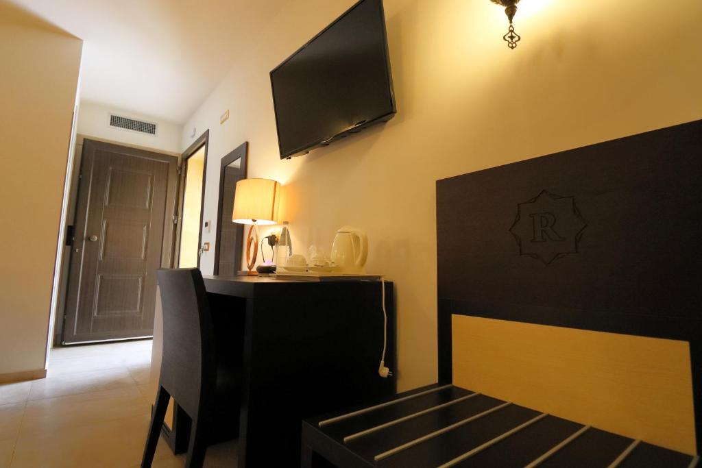 TV a/nebo společenská místnost v ubytování RIAD Comfort Rooms