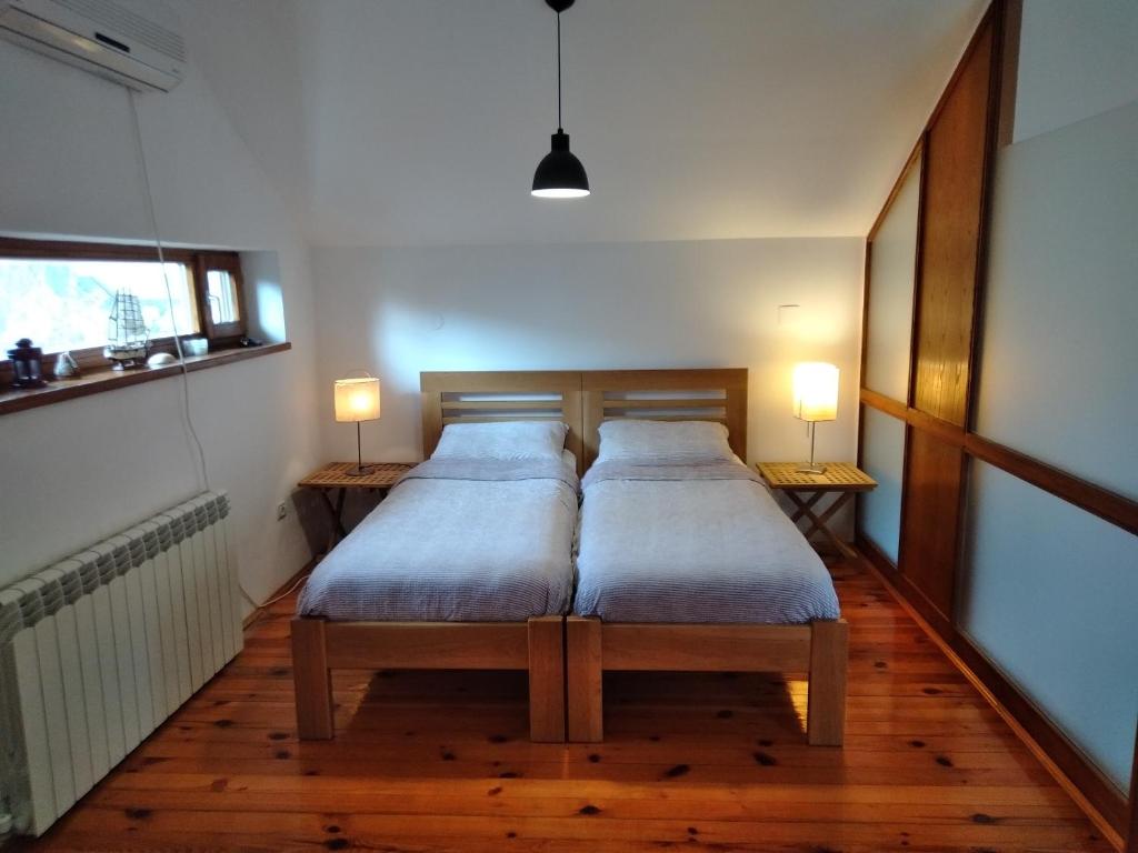 Postel nebo postele na pokoji v ubytování Belegis Villa