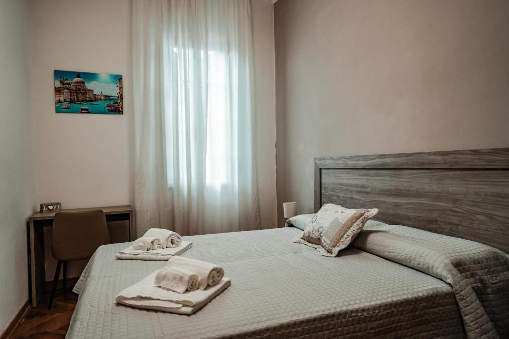 Łóżko lub łóżka w pokoju w obiekcie Angelica Home