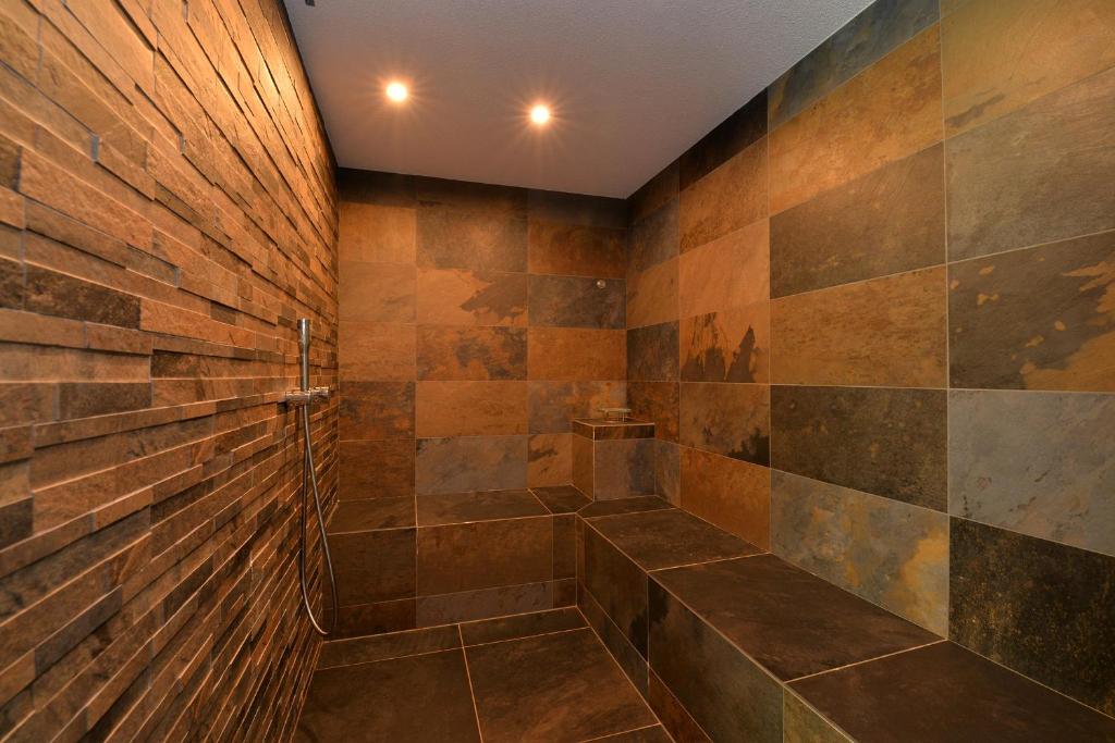 Koupelna v ubytování L'éclos des vignes - Appartements haut de gamme avec Spa