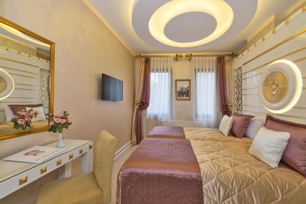 TV a/nebo společenská místnost v ubytování The Million Stone Hotel - Special Category