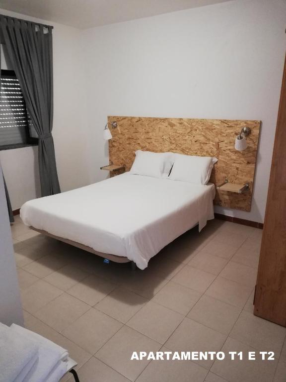 Postel nebo postele na pokoji v ubytování Hotel Eira Da Pedra