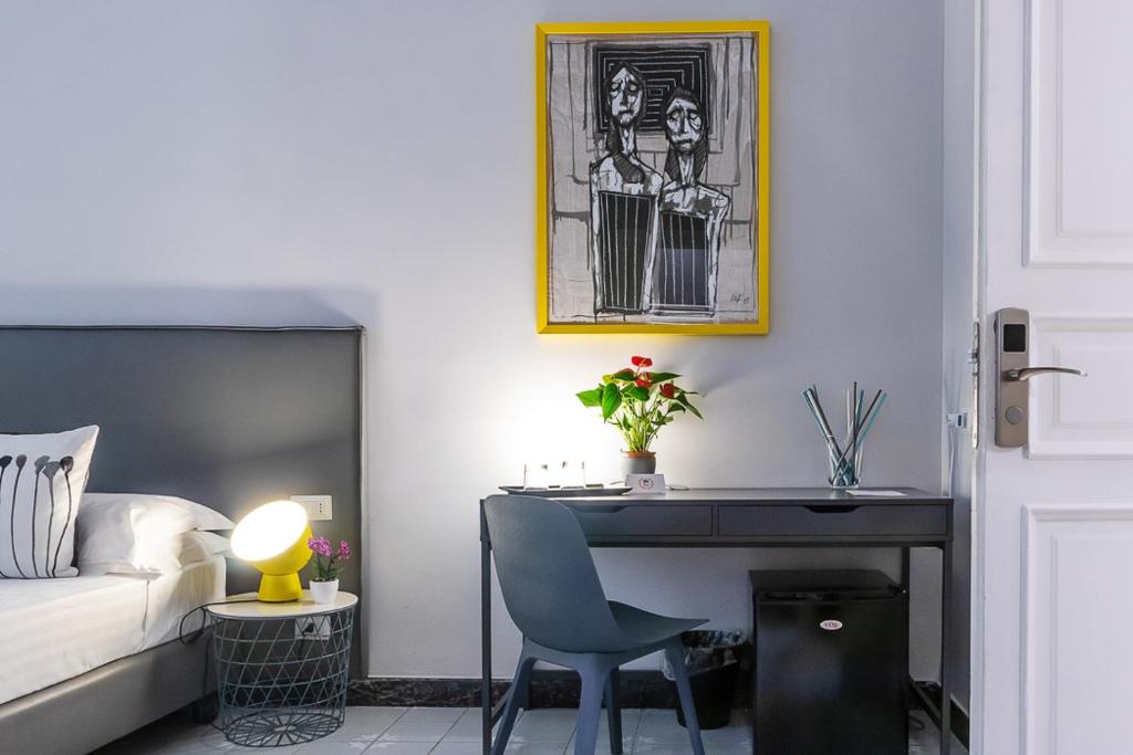 Postel nebo postele na pokoji v ubytování Re Vittorio De Luxe