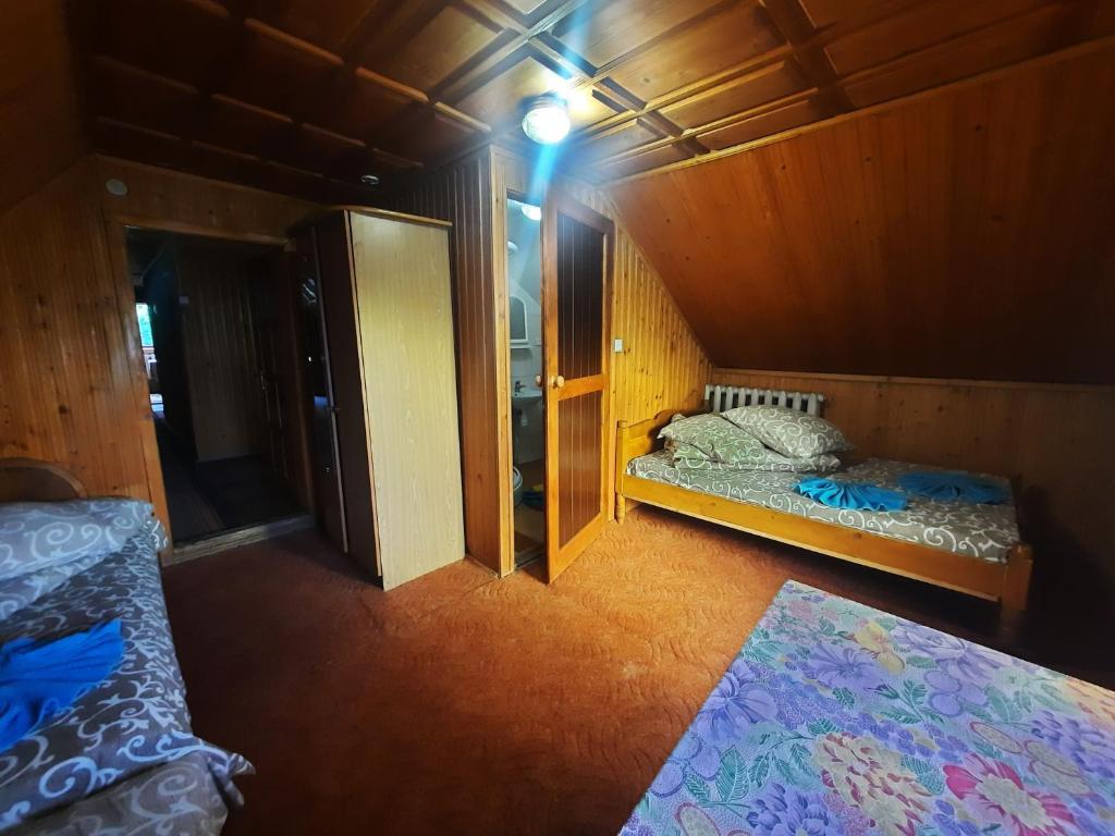 Postel nebo postele na pokoji v ubytování Dzherelo