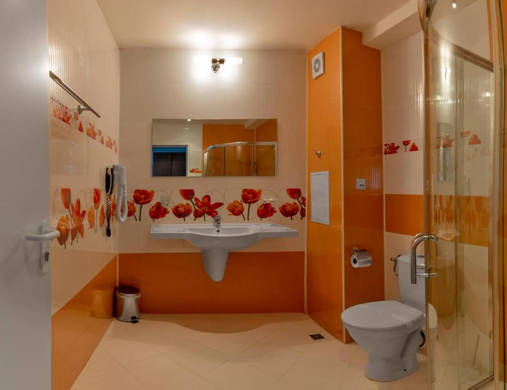 Koupelna v ubytování Hotel Glarus Beach