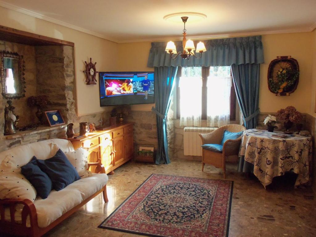 Telewizja i/lub zestaw kina domowego w obiekcie La Ermita De Prin