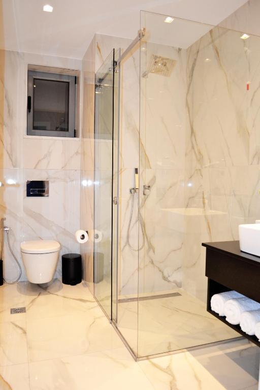 Koupelna v ubytování ArtNest Luxury Hotel & Suites