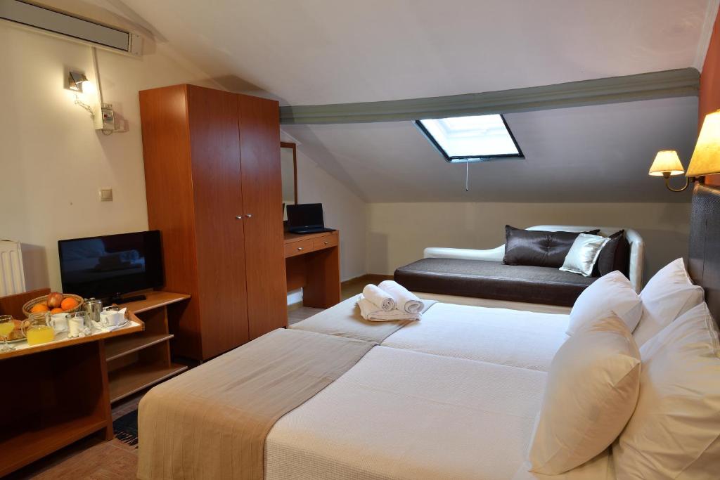 Postel nebo postele na pokoji v ubytování Four Seasons Hotel