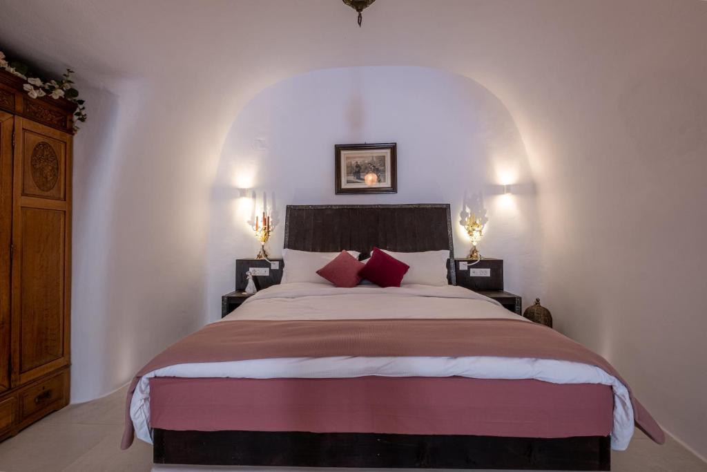 Postel nebo postele na pokoji v ubytování Abelis Canava Luxury Suites