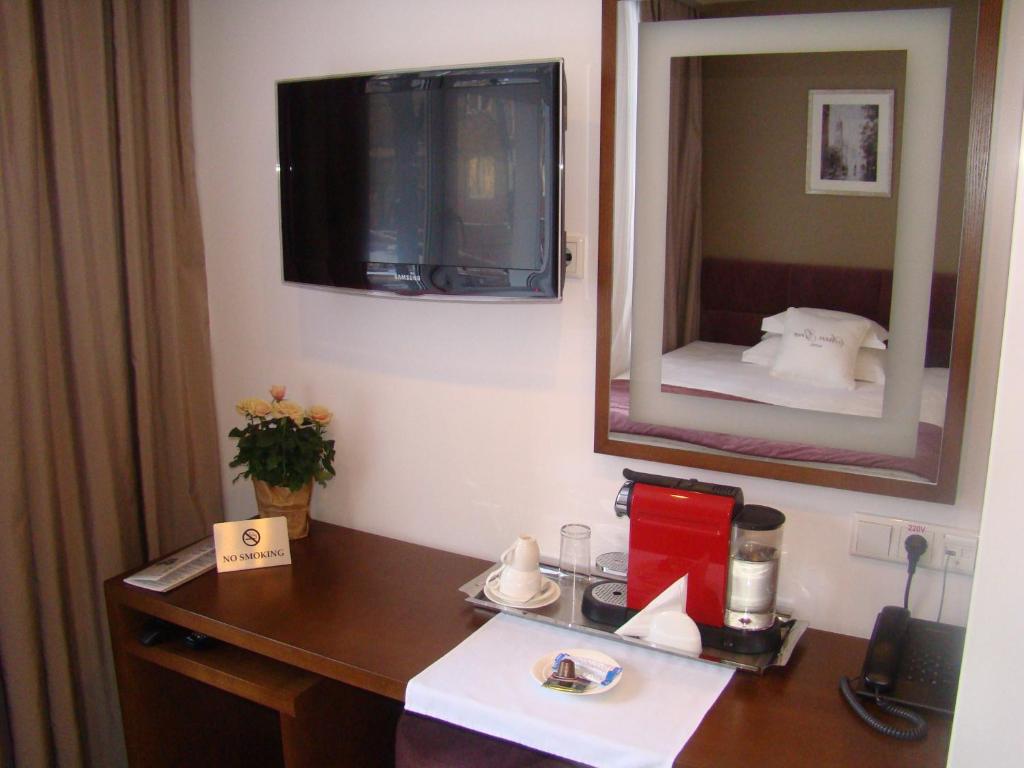 TV a/nebo společenská místnost v ubytování StanGret Hotel