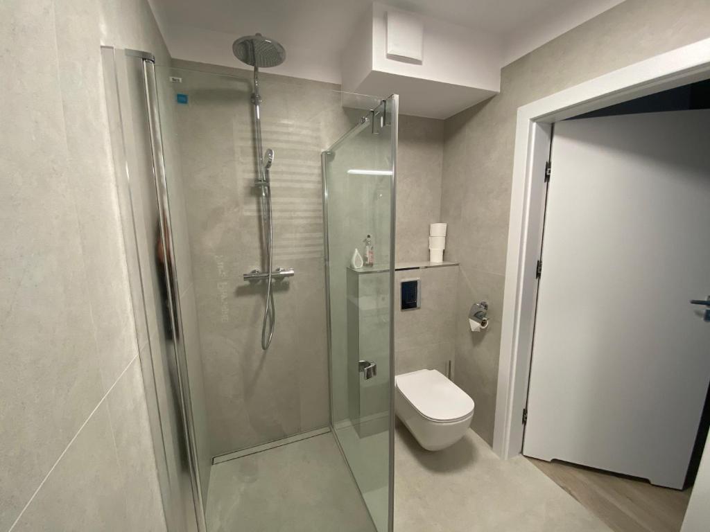Koupelna v ubytování Rodzinny Apartament Platany Centrum