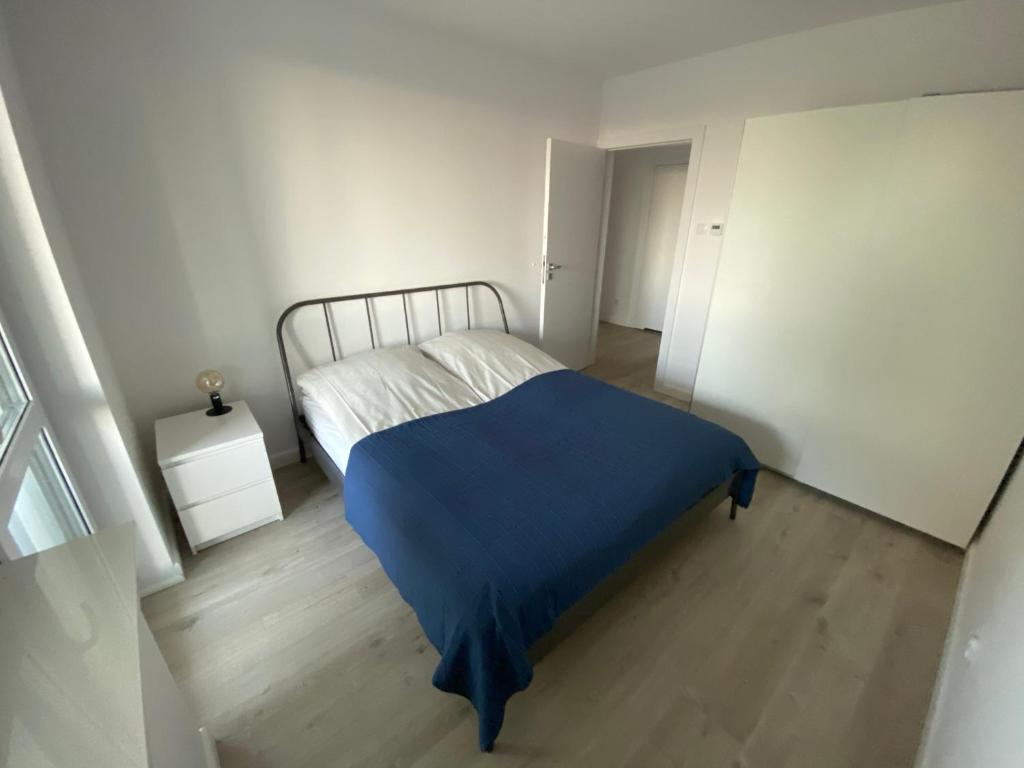 Postel nebo postele na pokoji v ubytování Rodzinny Apartament Platany Centrum