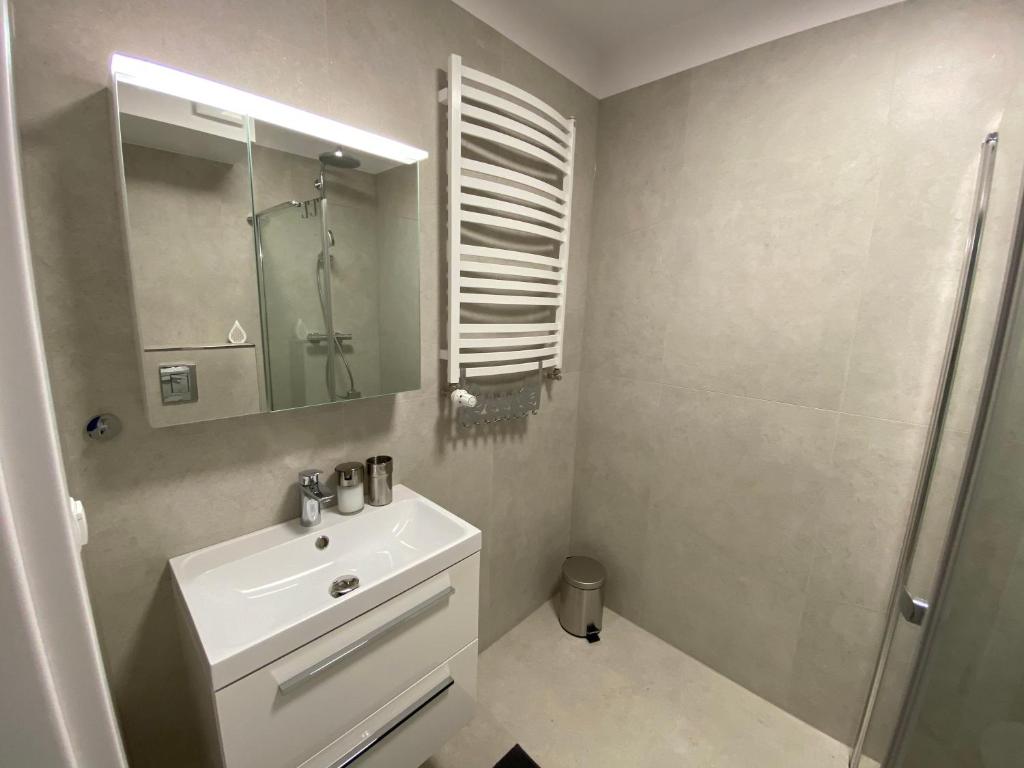 Koupelna v ubytování Rodzinny Apartament Platany Centrum