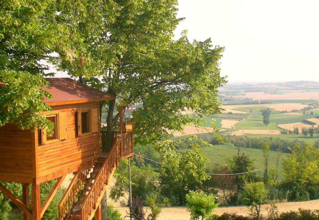 Kebun di luar Casa sull'Albero Aromantica