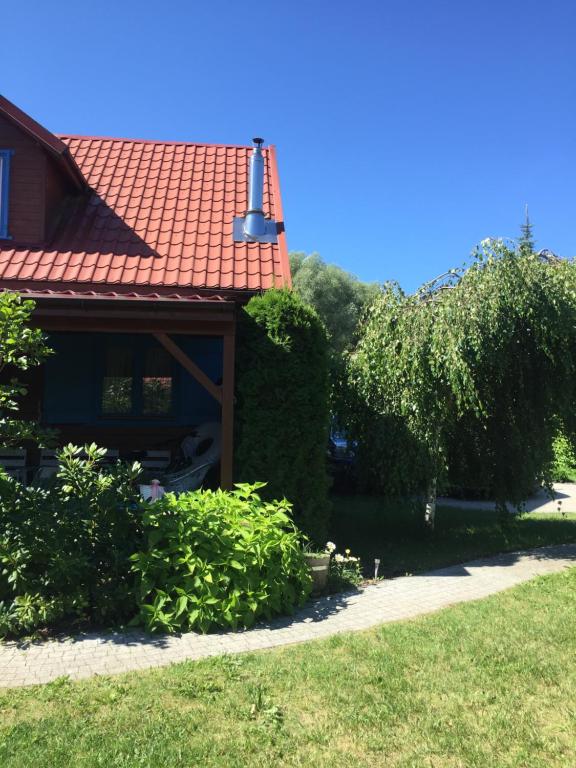 Vonkajšia záhrada v ubytovaní LELE-LAKE super domek Mazury