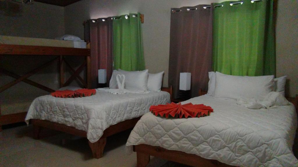 Postel nebo postele na pokoji v ubytování Mountain Faro Hotel