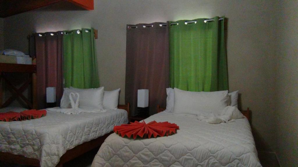 Postel nebo postele na pokoji v ubytování Mountain Faro Hotel