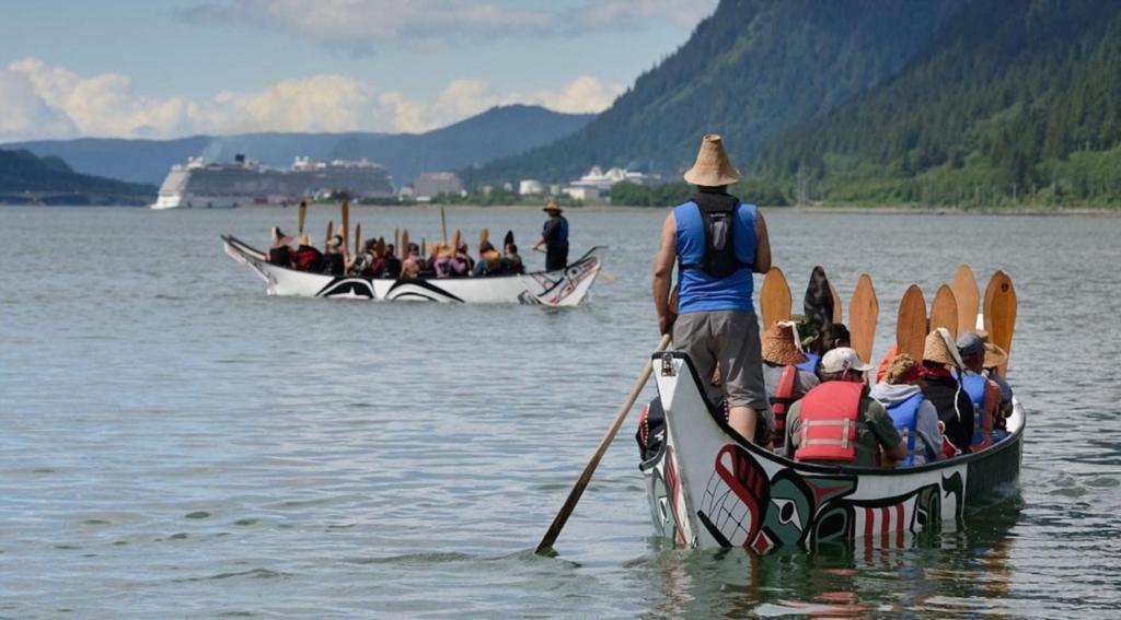 a group of people in boats on a lake at Captain's Quarters - Reduced Price Tours! in Mendenhaven