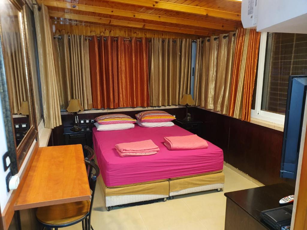 Postel nebo postele na pokoji v ubytování Shefer Guesthouse