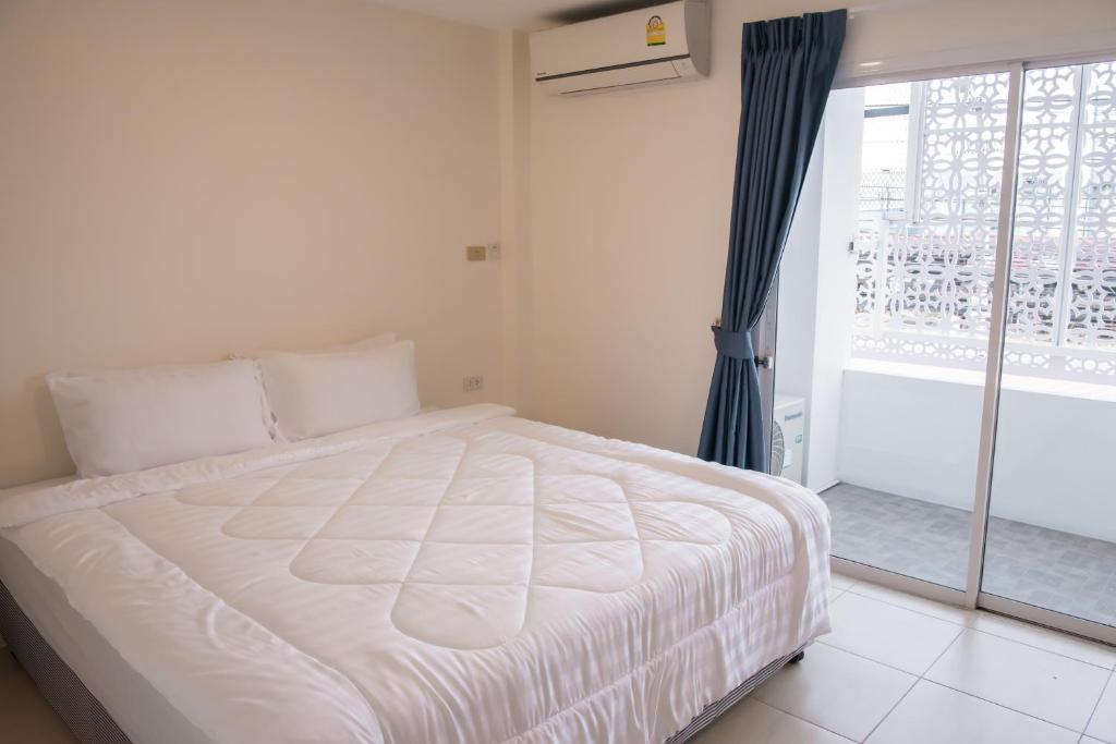 Postel nebo postele na pokoji v ubytování Mystays Phuket