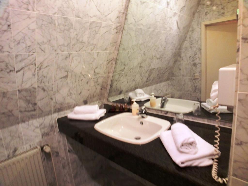 Koupelna v ubytování Hotel Nordic