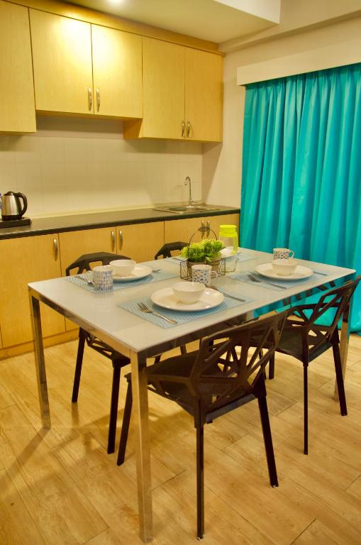 Kuchyň nebo kuchyňský kout v ubytování G5 HOTEL AND SERVICED APARTMENT