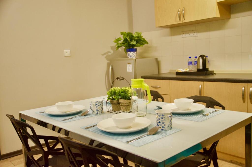 Kuchyň nebo kuchyňský kout v ubytování G5 HOTEL AND SERVICED APARTMENT