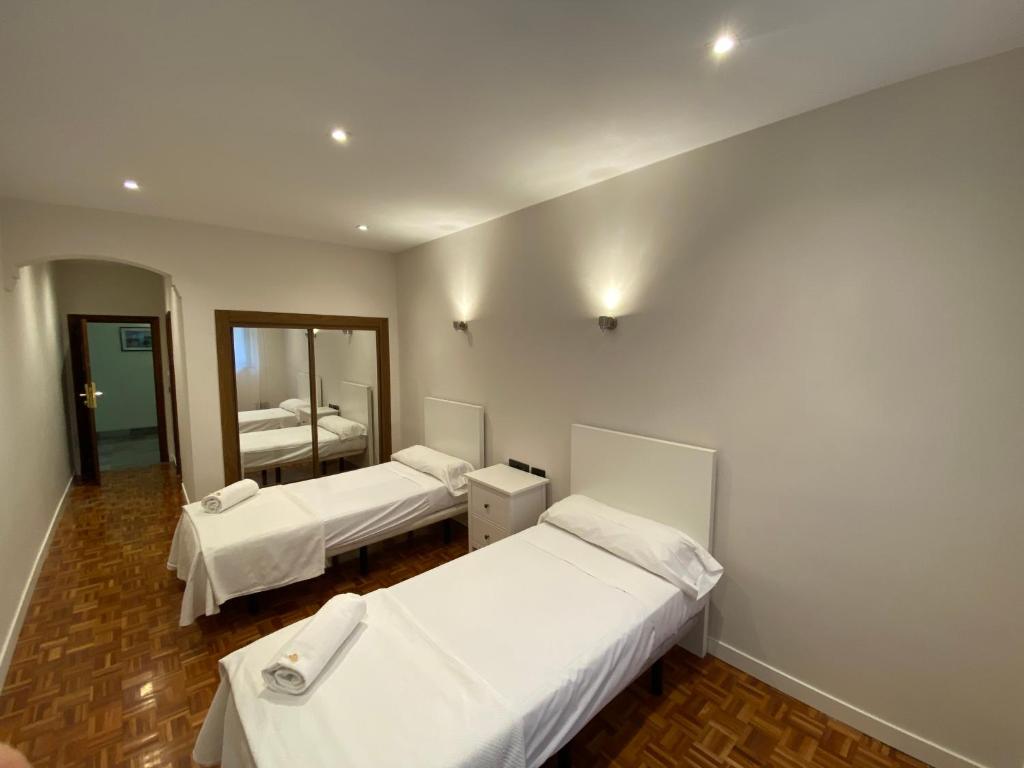 Postel nebo postele na pokoji v ubytování Hotel Castellano Centro