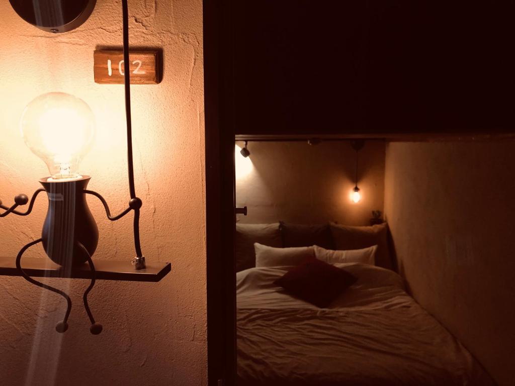 Postel nebo postele na pokoji v ubytování RoheN ASHINOKO