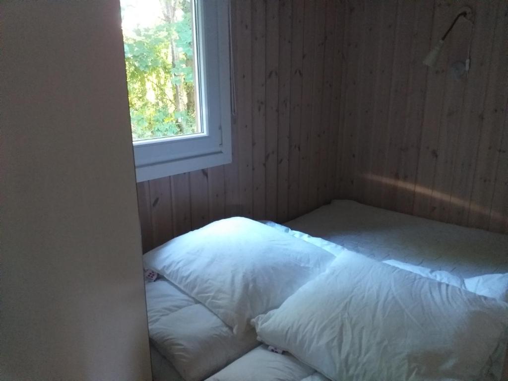 Postel nebo postele na pokoji v ubytování CampWest
