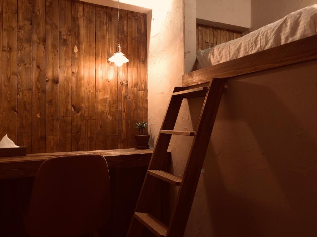 Postel nebo postele na pokoji v ubytování RoheN ASHINOKO