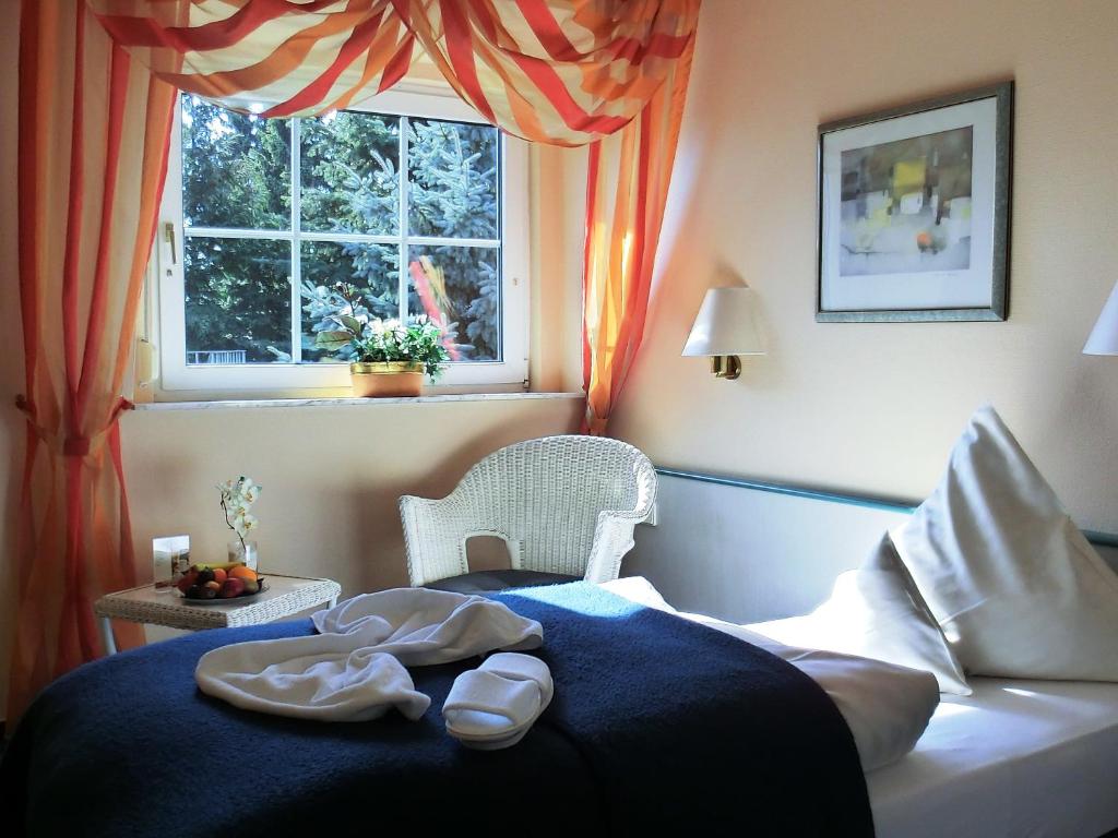 Postel nebo postele na pokoji v ubytování Hotel Nordic