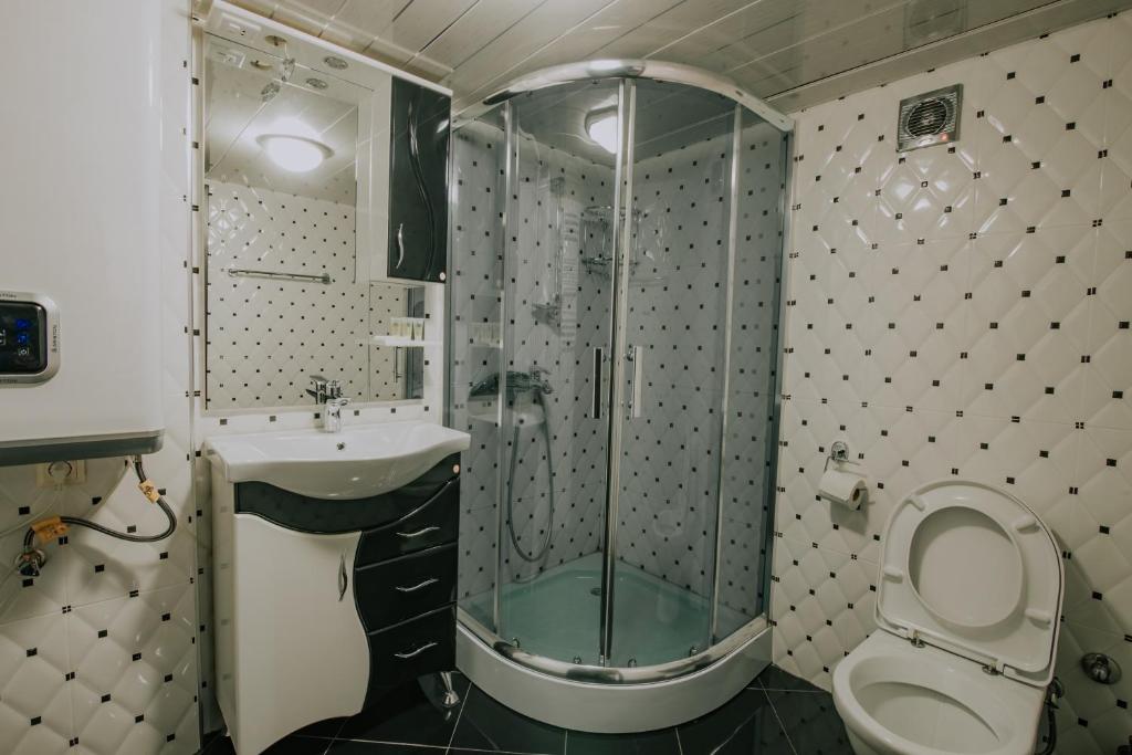 Koupelna v ubytování Orbi Residence Hotel Official