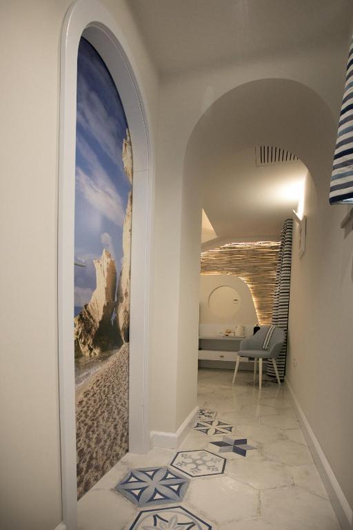Łóżko lub łóżka w pokoju w obiekcie Franco's House Tropea