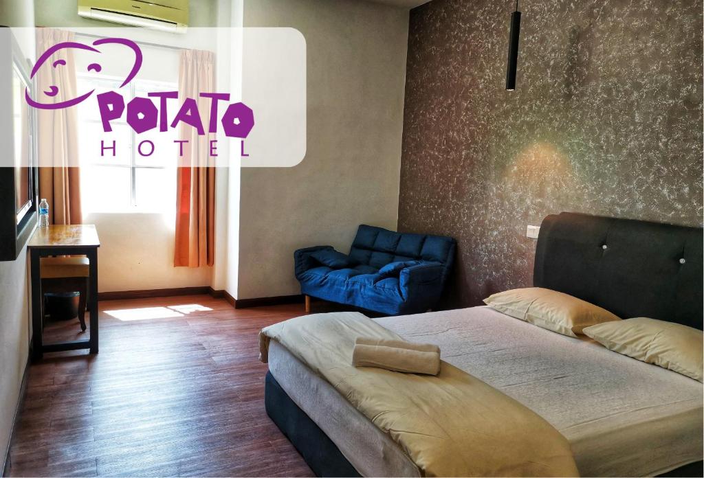 Postel nebo postele na pokoji v ubytování Potato Hotel