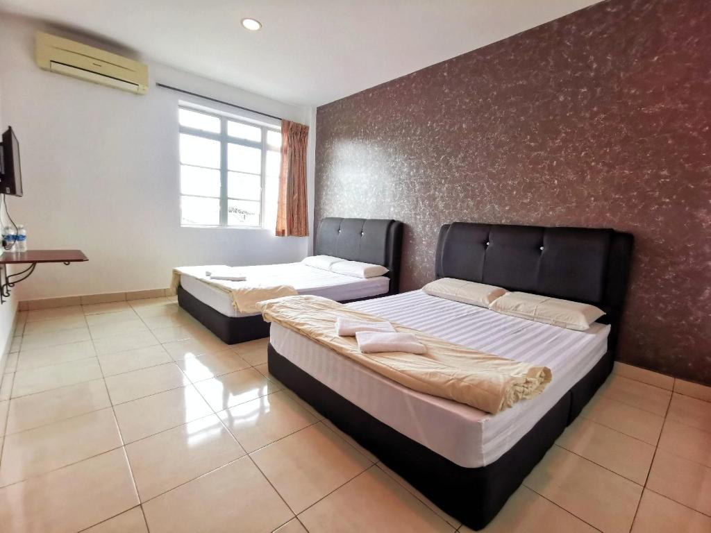 Postel nebo postele na pokoji v ubytování Potato Hotel