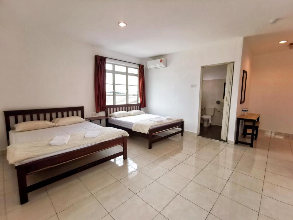 Postel nebo postele na pokoji v ubytování Potato Hotel