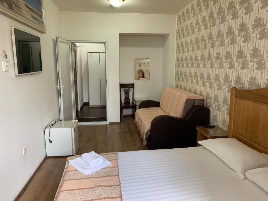 Postel nebo postele na pokoji v ubytování Hotel Funnytime