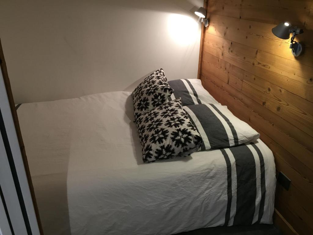 Postel nebo postele na pokoji v ubytování Lac du Lou, au pied des pistes